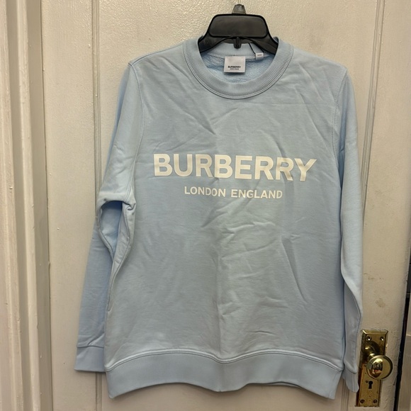NWT Burberry pale blue sweater size L.